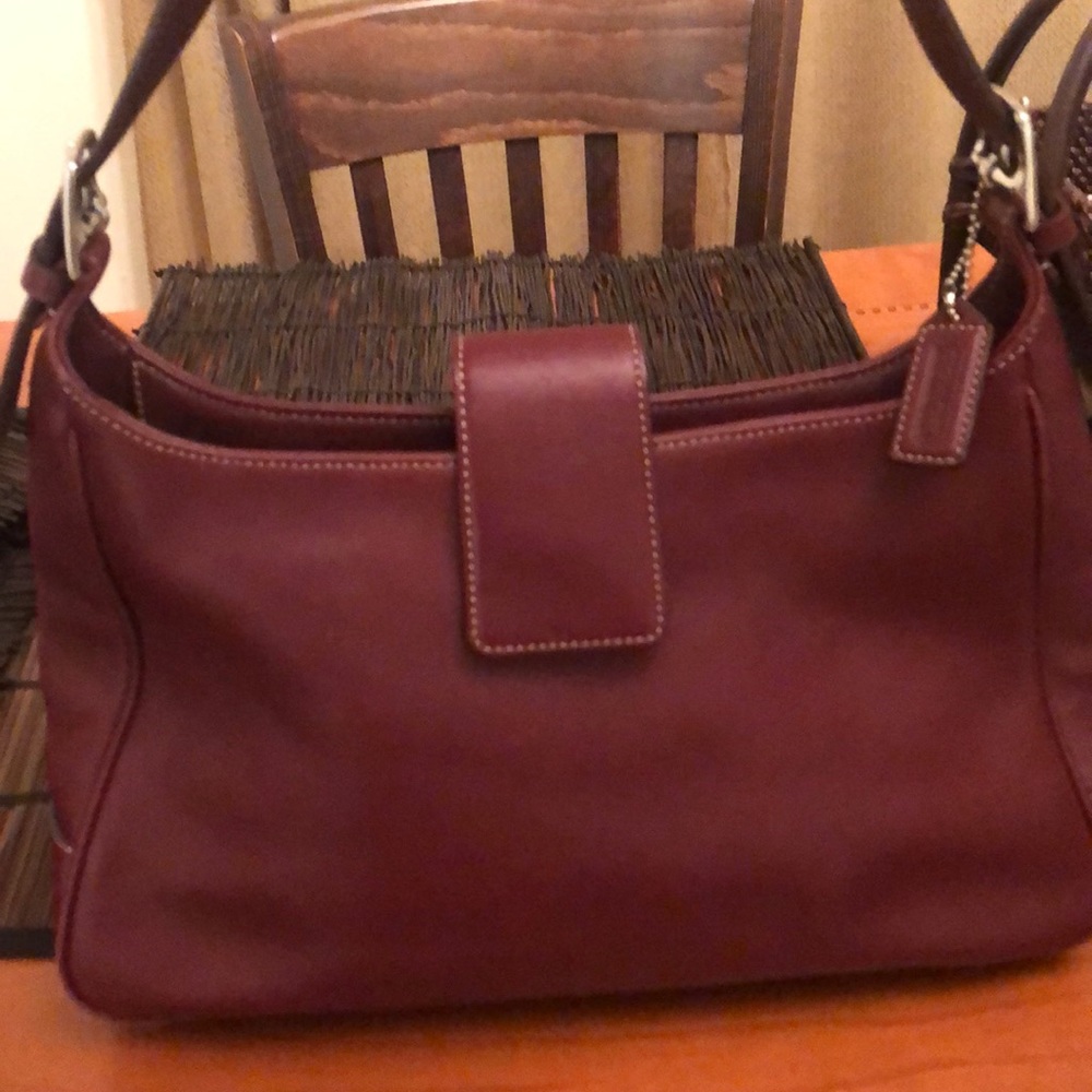 Burgundy coach purse